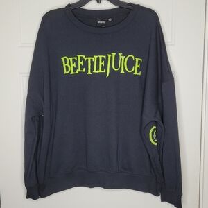 Beetlejuice XXL sweatshirt featuring a lime green scrollwork and spiderwebs